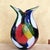 Vibrant Sculptural Studio Glass Centerpiece A stunning multicolored Murano‑style hand‑blown art glass vase featuring bold...