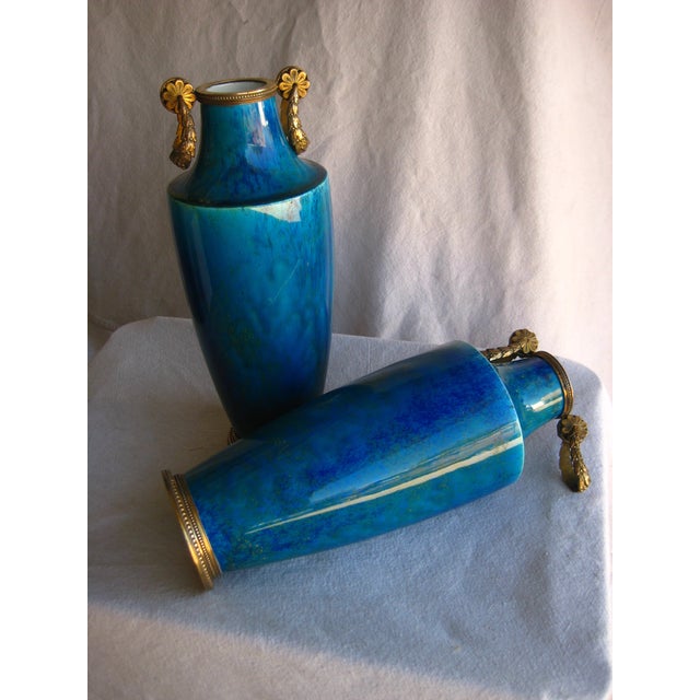 Paul Millet ( 1870 - 1950 )was a ceramist maker in Sevres , he won a world faire in Paris in 1889 and became famous for it...