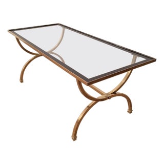 Brass coffee table with clear glass top and black lacquered edges For Sale