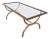 Brass coffee table with clear glass top and black lacquered edges For Sale