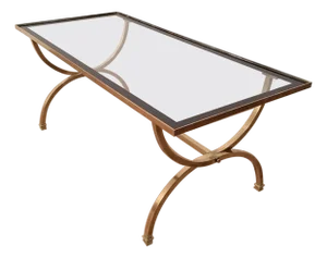 Brass coffee table with clear glass top and black lacquered edges