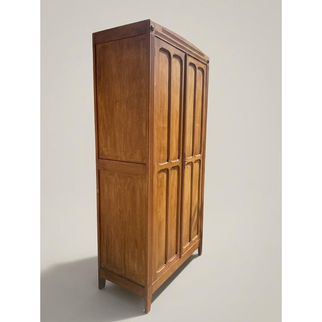 French Armoire with Fluted Details, 1950s, in Very Good conditions. Designed 1950 to 1959 This piece has an attribution...