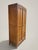 French Armoire with Fluted Details, 1950s, in Very Good conditions. Designed 1950 to 1959 This piece has an attribution...