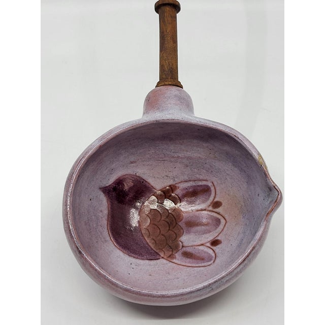 A ceramic ladle signed by the renowned Cloutier brothers, often called the "twins of French ceramics." Jean and Robert...