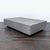 This modern coffee table features a clean rectangular design with a sleek weathered wood finish. Its low profile and...