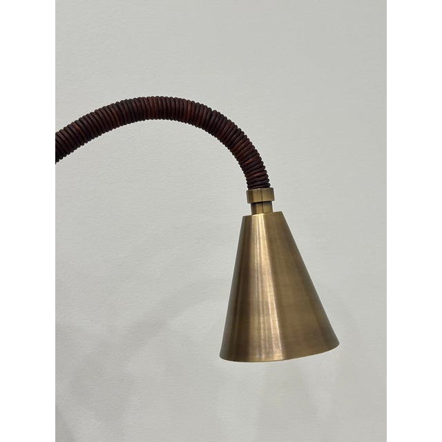Avantgarden Meander Reader Light, handcrafted in New England. Features a leather-wrapped flexible arm, oversized cone...