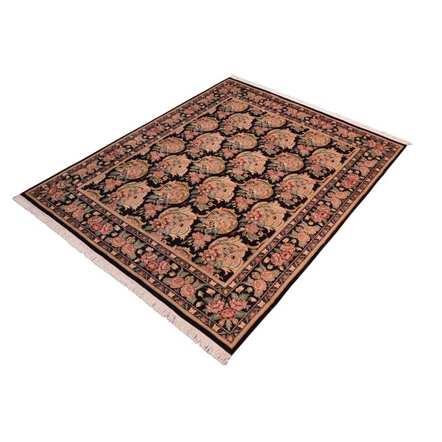 Elevate your space with this exquisite Pak Persian William Morris Hand Knotted Wool Rug, a masterpiece that blends...