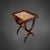 A finely crafted side table from France, circa 1830, in the Restoration style. The table features a walnut veneer on a...