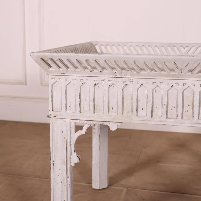 Early 20th C English painted oak lamp table. 1920. Four available. This piece is designed in the style of the selected...