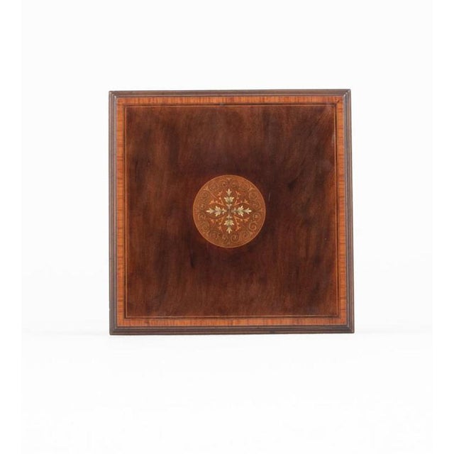 Here we have a rather unusual revolving bookcase in the Sheraton style Featuring pierced and fret work panels. The top of...