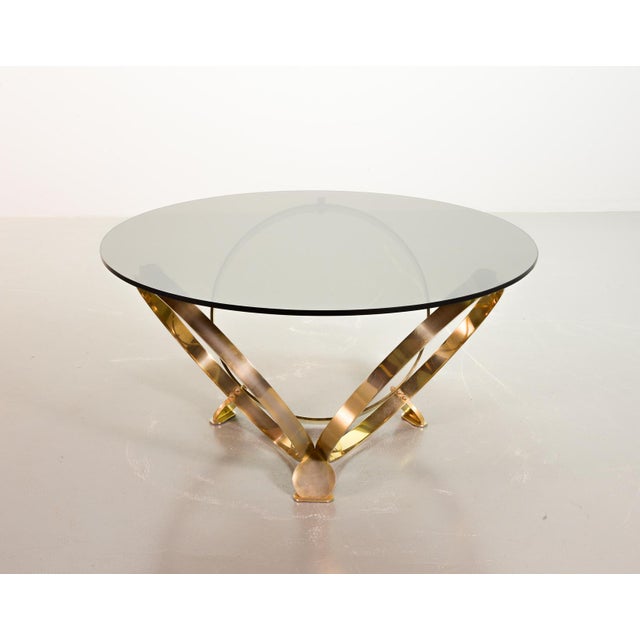 This striking coffee table by the renowned German designer Knut Hesterberg features a sculptural brass finished aluminium...