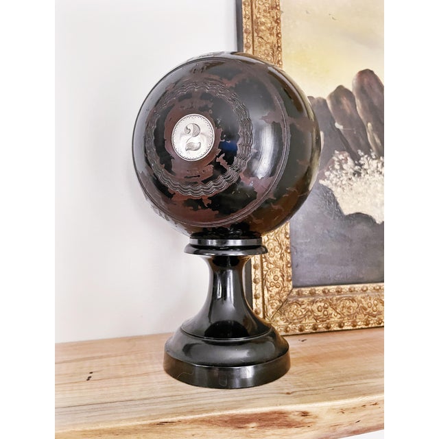 A wonderful antique English circa 1937 heavy wooden lawn bowling or bowls ball with two sterling silver plaques, one...