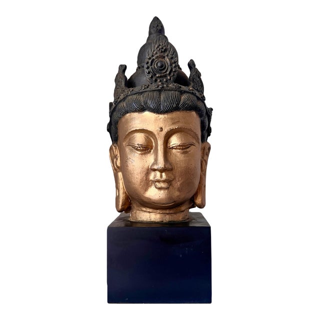 Mounted Asian Gold Buddha Head on Black Pedestal For Sale