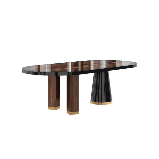 The Columbus Dining Table is a modern oval dining table that combines artistry and functionality to elevate any dining...