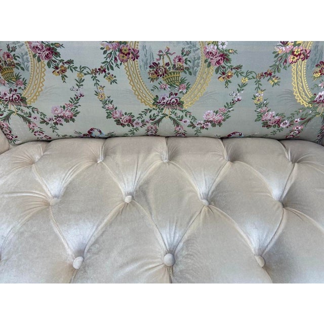 A refined 1980s French Louis XVI-style settee, handcrafted in solid beechwood with a recently refreshed antique gold...