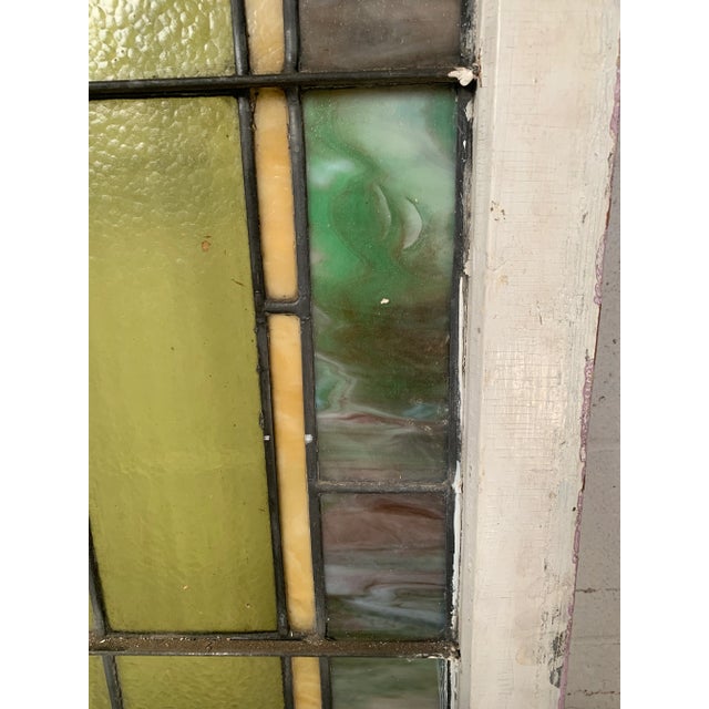 Vintage art stained glass featuring roses and hearts. Dimensions: w33" x d1.75" x h 43.5" Condition: age appropriate wear,...