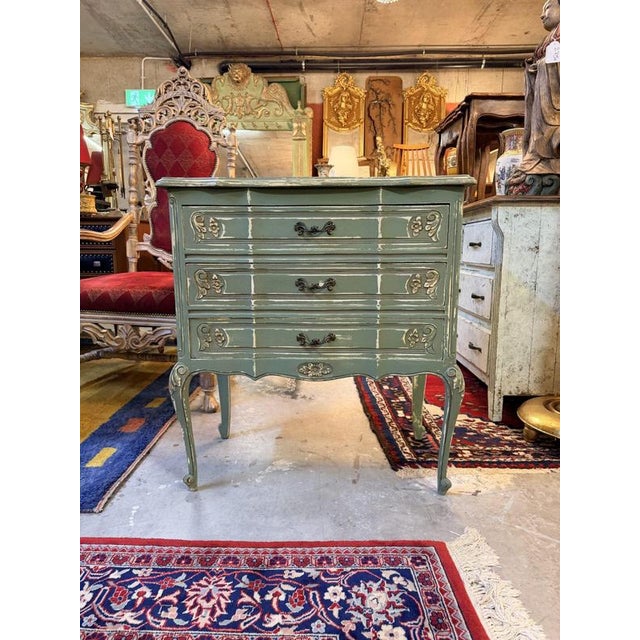 Lovely French three drawer chest full of character, raised on cabriole legs and finished with classic brass handles and...