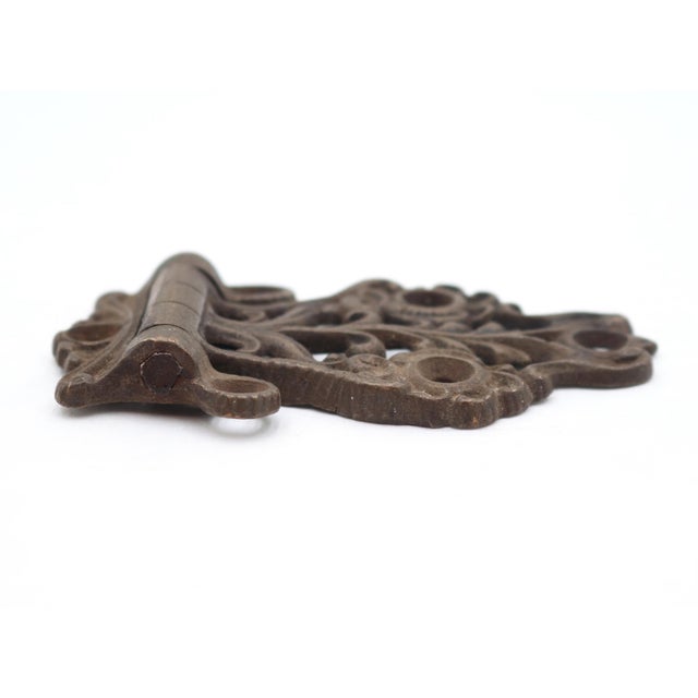 Victorian style ice box hinge made of brass with a patina finish. The original mounting screws are not available. Good...