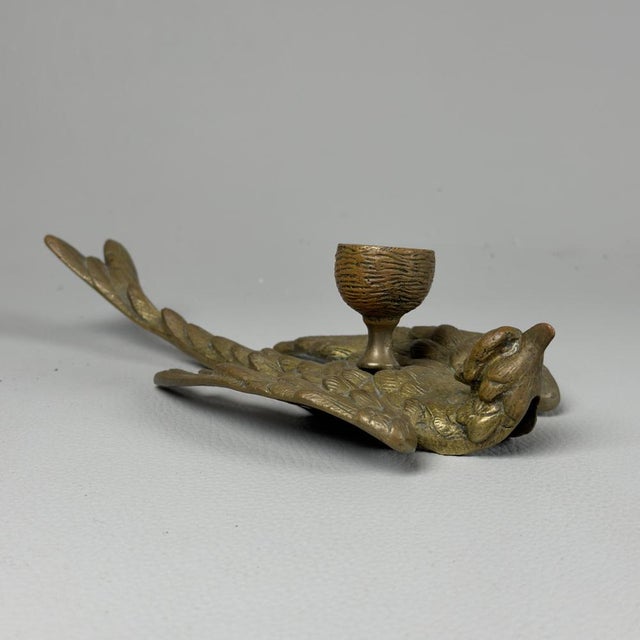 A delightful small bronze sculpture serving as a candle holder (cider candle), dating back to the 1950s. An object with...