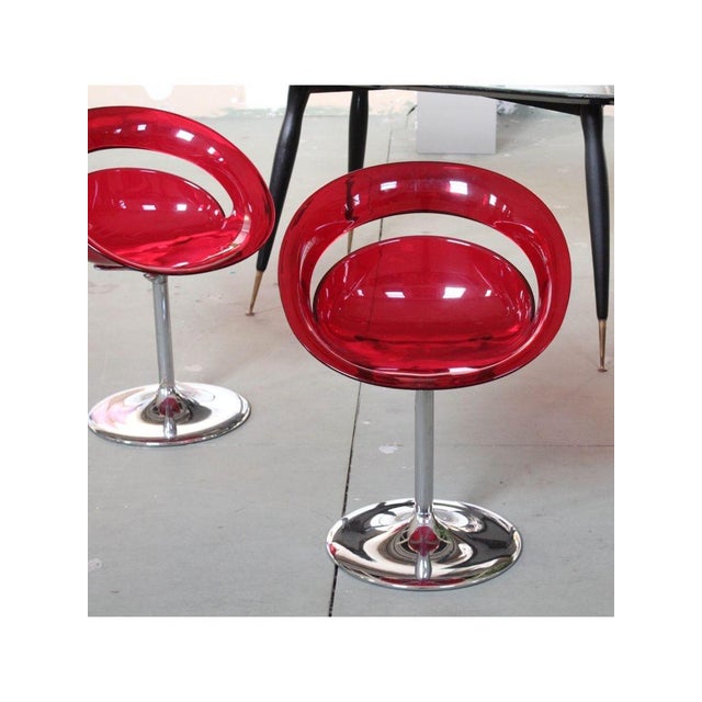 Type Pair of swivel chairs Date 1970 Model Tina 2 Origin Italy Materials Chromed steel, Plastic Width 57 cm Depth 50 cm...