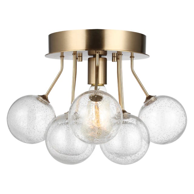 The Bronzeville one light semi flush fixture in satin brass enhances the beauty of your home with ample light and style to...