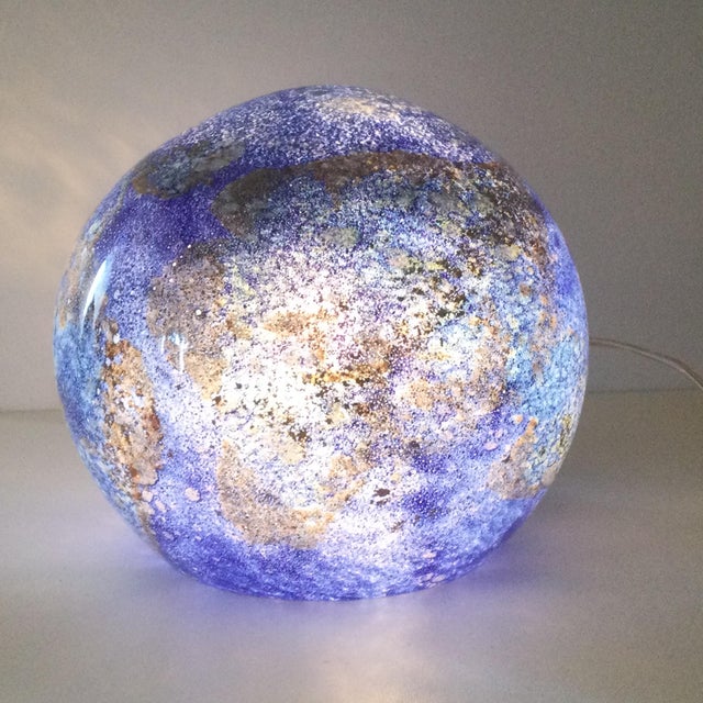 Magnificent multi-layered blown glass table lamp depicting the Earth with its continents and oceans. Ideal as a bedside...