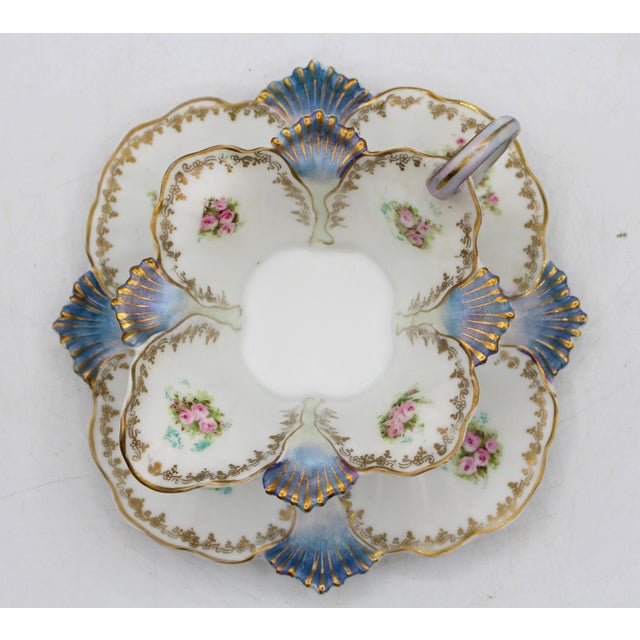 Late 19th century porcelain sauce boat and undertray by R.S. Prussia. German. Lovely scalloped form, soft colors, rose...