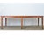A 19th-century French farm table made from solid pine, circa 1870. The top consists of four long tongue and groove planks...