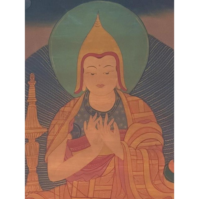 A finely executed mid-19th century Tibetan thangka depicting Je Tsongkhapa (1357–1419), the celebrated Buddhist scholar,...