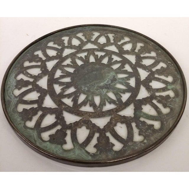 This trinket features carvings that are so detailed and precise that you can almost feel the texture of the metal. The...