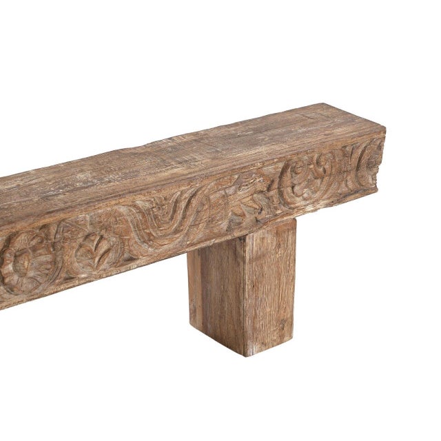 Handcrafted from solid teakwood, this Indian Carved Front Rustic Teakwood Bench features a beautifully carved apron. A...