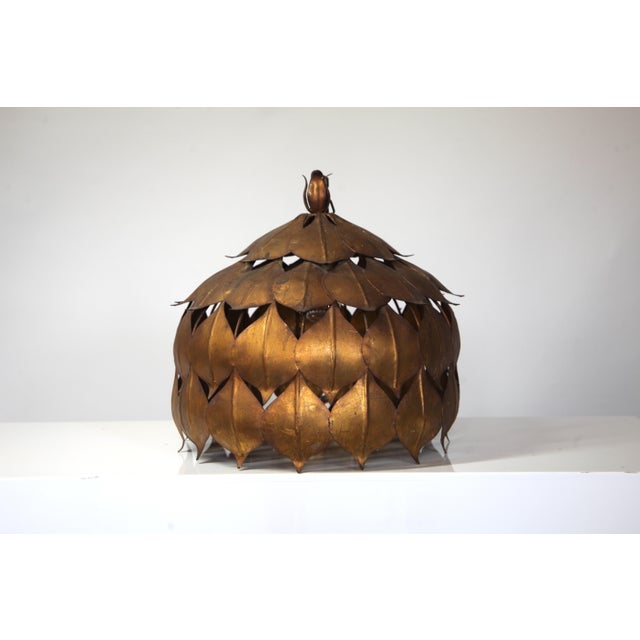 Large gilt metal ceiling lamp by Hans Kögl, Germany, 1960s. Designed as a stylized lotus flower, the lamp reflects the...
