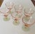This set of pink depression glass compotes appears to be “Watermelon” glass, likely manufactured by companies like Tiffin...