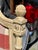Romantic king size French Provincial style headboard having lovely detailed carvings and cream paint, complimented by...