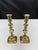 A lovely pair of vintage European Brass Candlesticks. The pare features a classic turned design and square bases. Some...