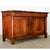 Dimensions: 42 ½” H x 72 ⅝” W x 28” D An impressive French Empire buffet made of figured walnut in a rich auburn hue that...
