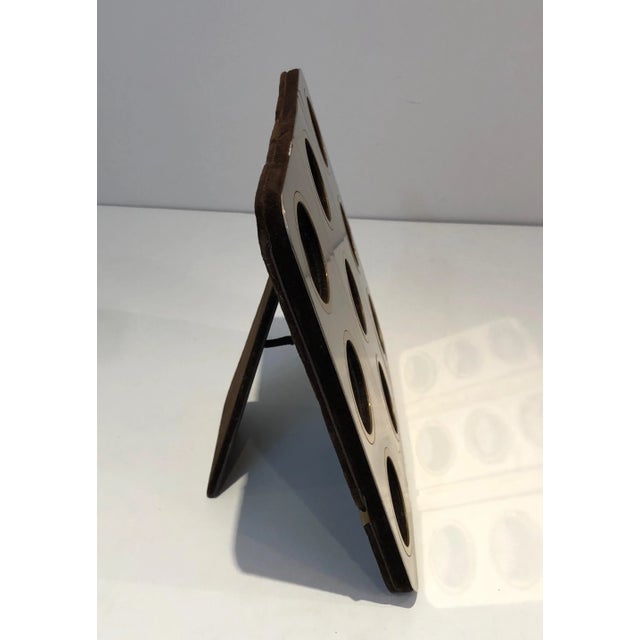 This rare pictures frame is made of brushed steel and brass. This is a French work, circa 1970.