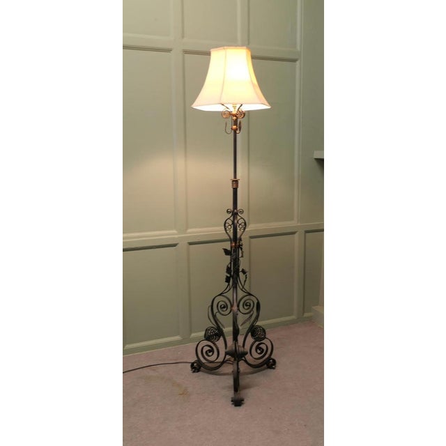 Decorative Wrought Iron Telescopic Floor Lamp This is a very unusual piece, the lamp has a very decorative wrought Iron...