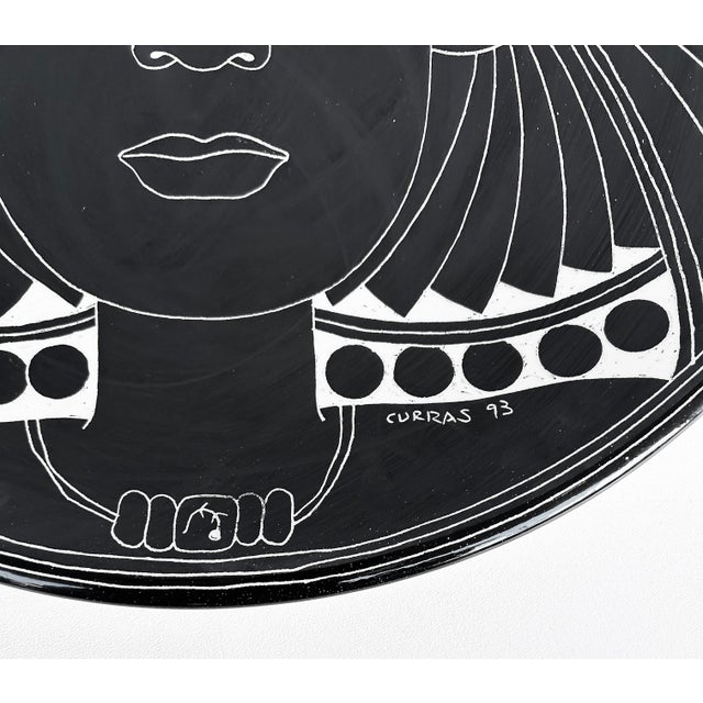 Vintage Curras Brothers Hand-painted Pottery Charger, Signed, 5 Faces Available Offered for sale is a vintage Ronald...