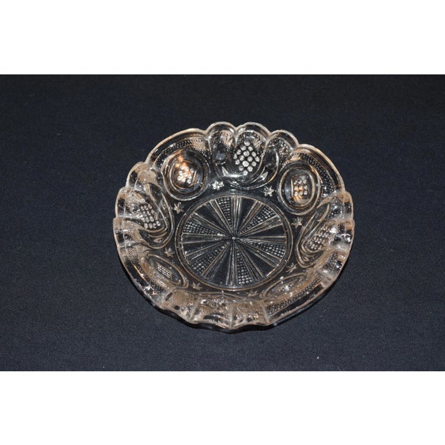 EAPG Pressed glass bowl with lovely pattern and a gracefully fluted rim.