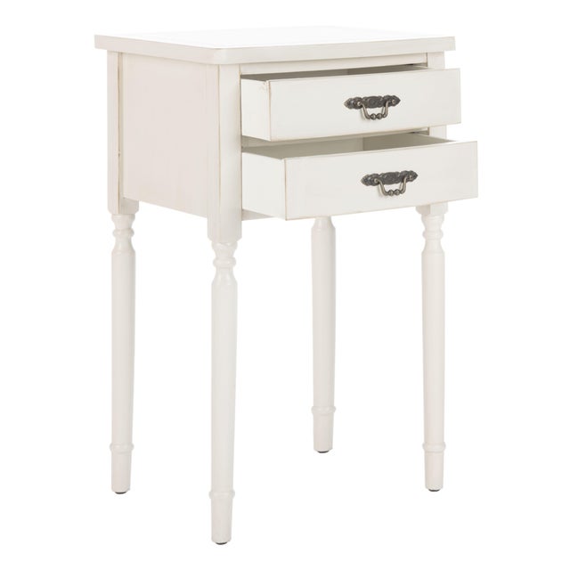 A coquettish, feminine disposition is what gives The End Table it's charm. Inspired by the boudoirs of great French...