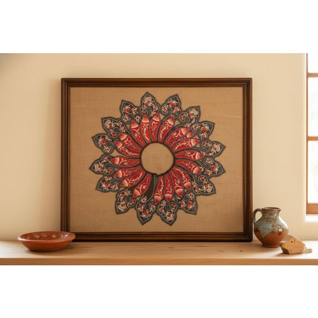 Add a touch of theatrical grandeur and cultural richness to your home with this framed Chinese embroidered collar....