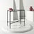 Introducing the Isabellina Metal and Glass Accent Table in black and clear. This sleek table combines modern design with...