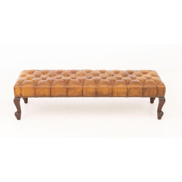 Victorian Style Button-Tufted Brown Leather Upholstered Mahogany Bench, with brass riveted trim and four cabriole legs....