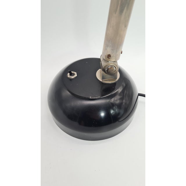 Authentic black Hala Zeist model 144 desk lamp, designed by Herman Busquet (H.Th.J.A. Busquet) in the Netherlands. This...