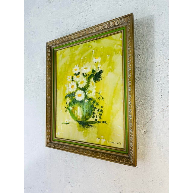 The painting features a still life of white daisies with yellow centers, arranged in a vibrant green vase. The flowers are...
