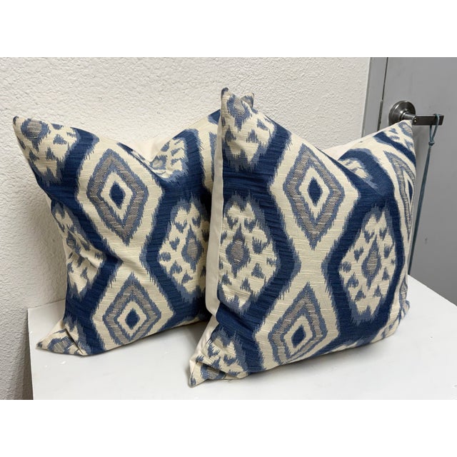 Design Plus Gallery presents a Pair of Thom Filicia Home Collection Pillows. The Rigi Ink pattern displays repeating...
