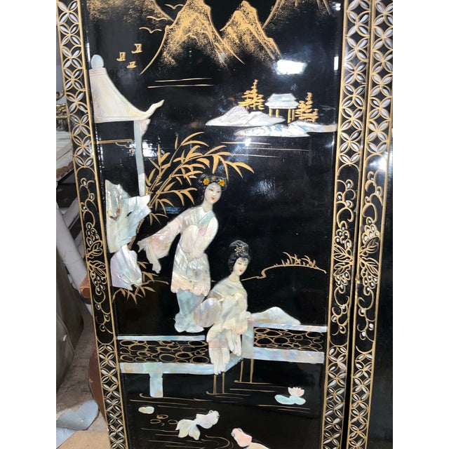 4 vintage lacquered wood Asian panels depicting women. Beautifully aged to add an Asian charm to any room of your home.