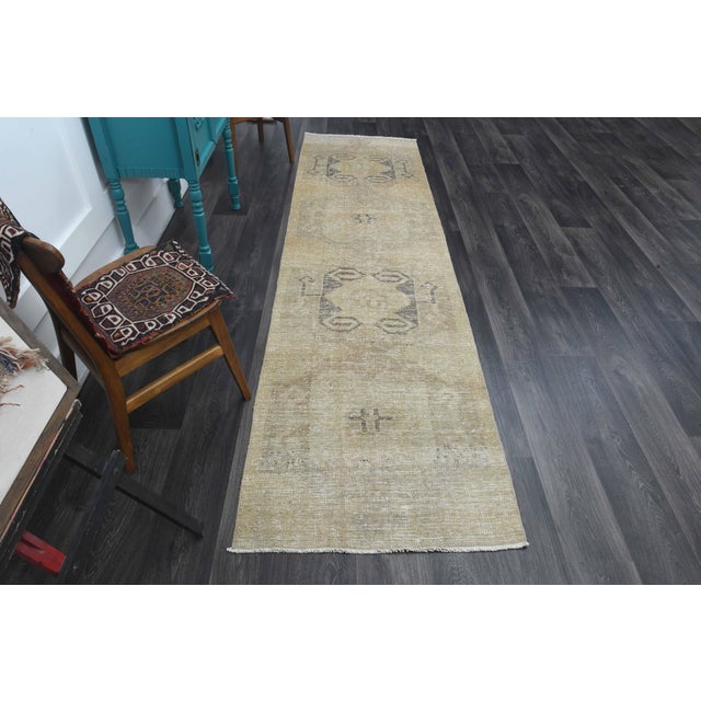 Vintage Hand-Knotted area rug is a semi-antique vintage area rug. The '70s Eastern region of Anatolia's unique rug is...
