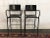 Set of 4 armed, bar chairs. Designed by Carlo Bertoli for Segis. Breeze style. Made in Italy. Molded black plastic seats...